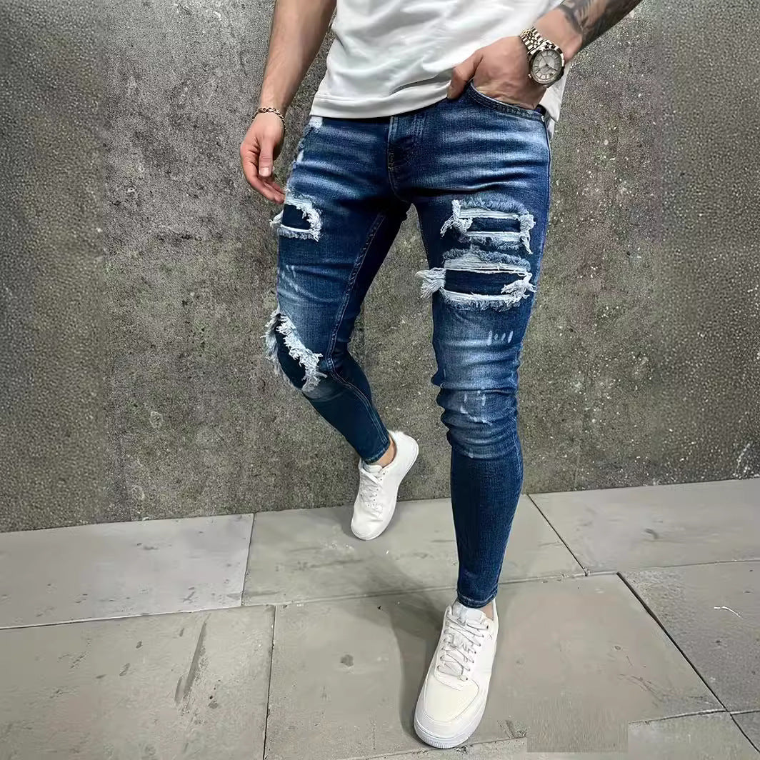 Jeans de hombre con parche desgastado