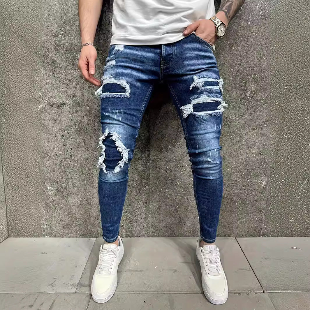 Jeans de hombre con parche desgastado